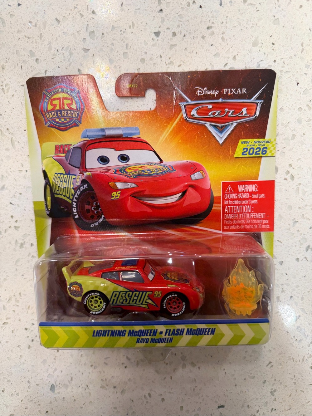 NWT Disney Cars Race & Rescue Lightning McQueen die-cast.